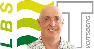 Portrait von Kurt Bernsteiner vor LBS Voitsberg Logo