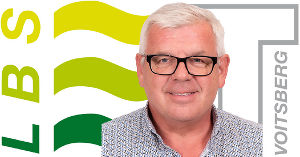 Portrait von Ronald Scherz vor LBS Voitsberg Logo